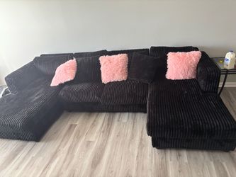 U shaped black couch