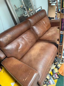 Leather sofa : paid 3k : now only $99