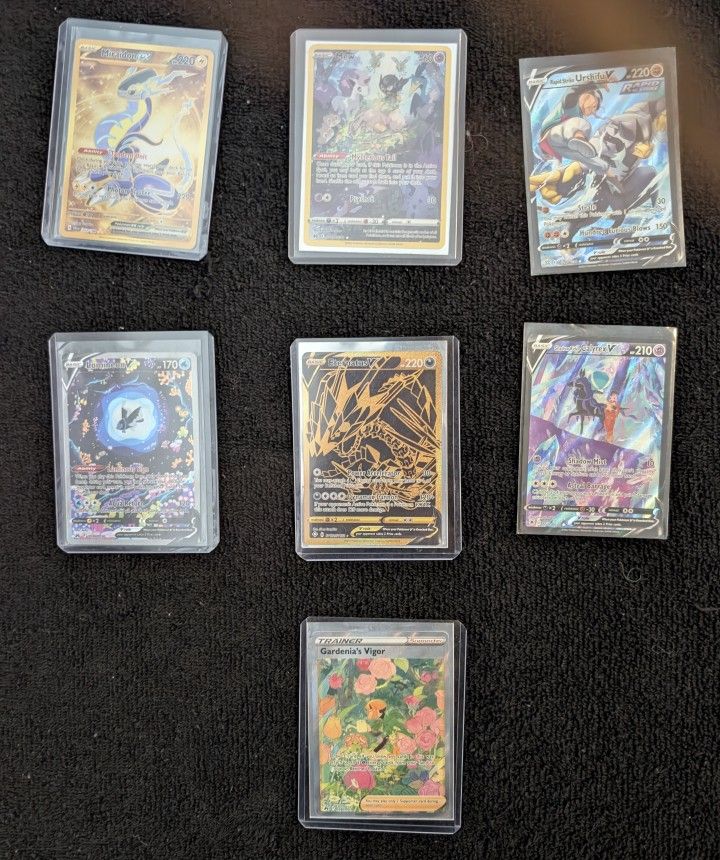 7 ULTRA RARE POKEMON CARDS.