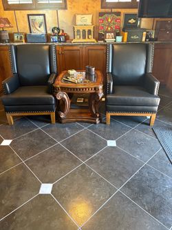 Leather Wingback Armchairs with Solid Wood Legs- $150 each