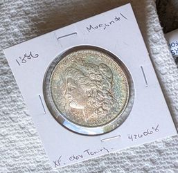 1886 Morgan silver dollar light toning