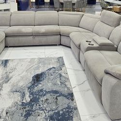Light Grey 3 Recliner Sectional With Pull Out Sleeper