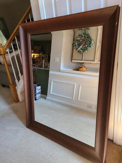 Framed wall mirror