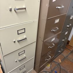 Four drawer filing cabinets, $10 each