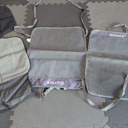 Kids Kickmats And Booster Seat Under Cover