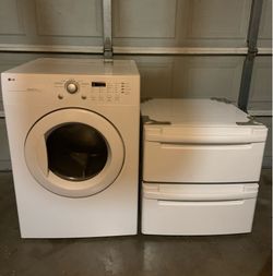 LG Dryer and two LG stands Pedestales