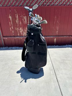 Golf clubs with covers