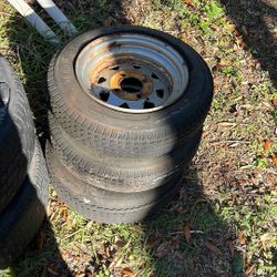 3 trailer wheels 40 bucks or obo 
