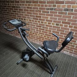 EXERCISE BIKE ADJUSTS TO DIFFERENT POSITIONS & FOLDS UP & THE MONITOR WORKS