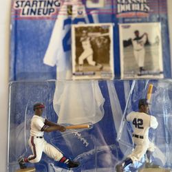 1997 Starting Lineup Classic Doubles action figure set featuring baseball legends Hank Aaron and Jackie Robinson
