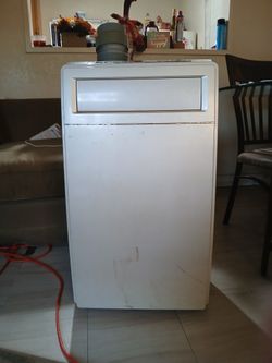 LG 12,000 BTU PORTABLE AIR CONDITIONER