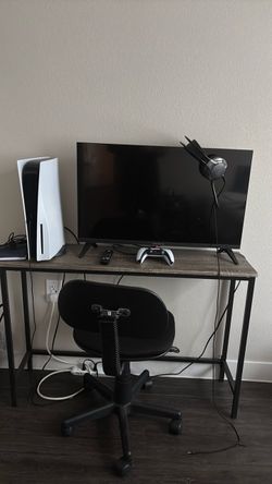 ps5 controller headset and tv,desk and chair