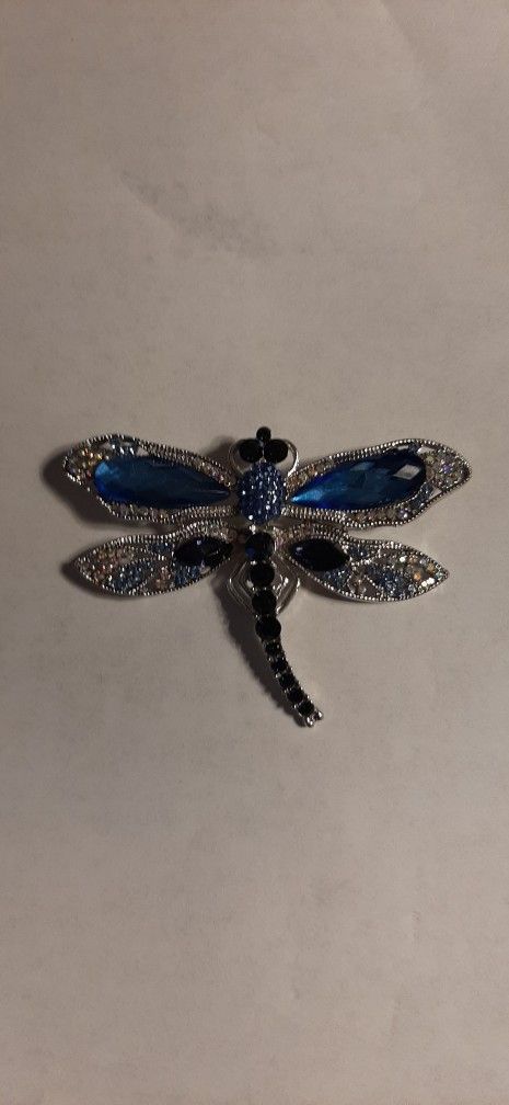Silver-tone dragonfly brooch with blue stones