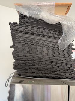 Padded floor tiles