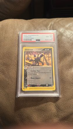 2003 Umbreon non-holo rare from the EX Sandstorm set, graded PSA 8 NM-MT