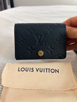 Black leather embossed Louis Vuitton card holder