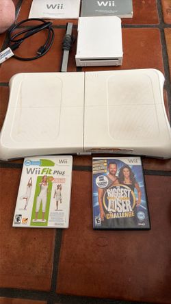 Wii Balance board, console, controllers, 4 games and nunchucks