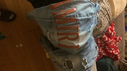 AMIRI Light Wash Distressed Denim Jeans