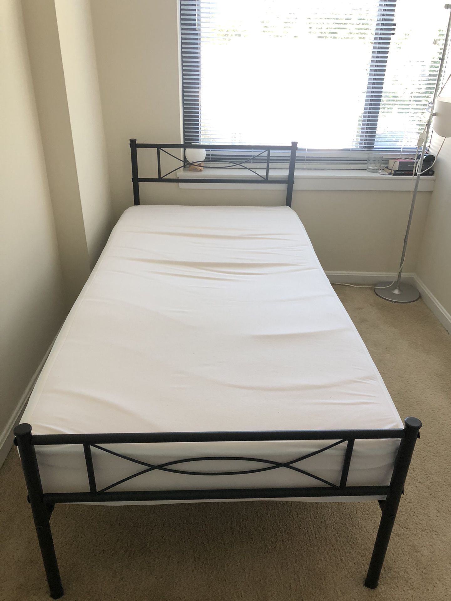 Used (very good condition) matress and bed frame