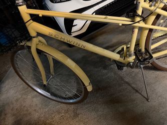 Schwinn cruiser yellow bike