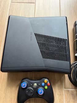 Xbox 360 Slim Console.              Q27