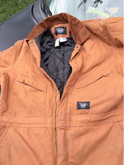 This is a Walls Blizzard-Pruf brown duck canvas insulated coverall, featuring a corduroy collar and quilted interior lining.
