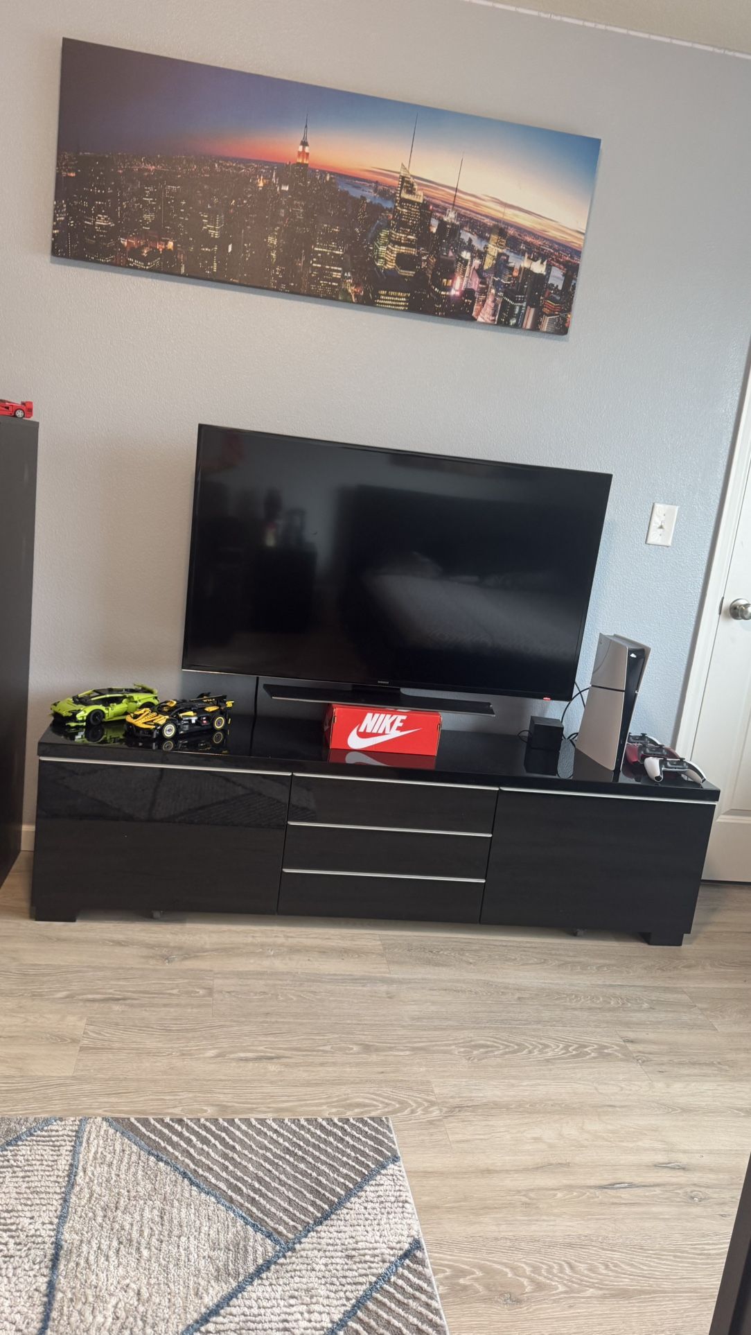 Tv And Black Tv Stand 