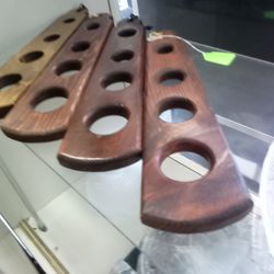 wooden paddles are beer flight trays designed for serving and tasting samplers of beer or other beverages.