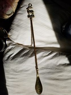 Vintage brass long handle deer figure shoehorn