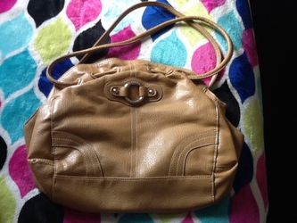 Tan minicci hand purse