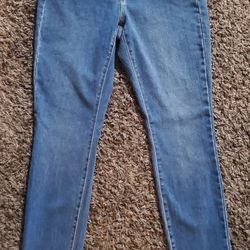 Michael Kors  new with tag mid-rise skinny stretchy jeans size 4