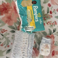 Size 1 Pampers & Huggies Diapers (Opened)