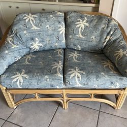 Vintage Rattan Loveseat, Swivel Rocker And Footstool $100