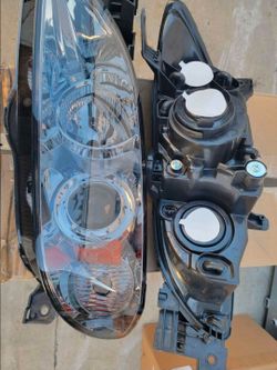 04-09 MAZDA3 Projector headlights