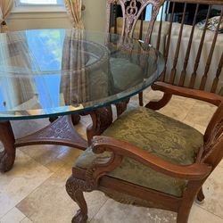 Custom made smoked beveled Glass top  table and all wood lions head base