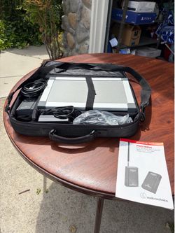 Epson projector, screen, and speakers