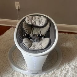 Munchkin baby swing $50