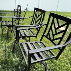 4 FREE  Iron swiveled patio chairs
