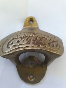 old solid brass coke opener
