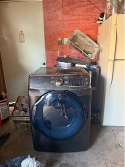 Black Samsung front load dryer