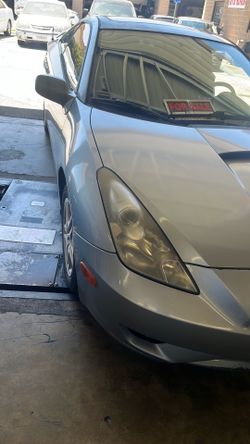 2003 Toyota celica  4 cylinder running good gas saver  400+ miles per full tank