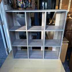 Small wooden 9 cube shelf bookcase / shoe storage. 8” deep x 26 1/2 x 26 1/2H. 
