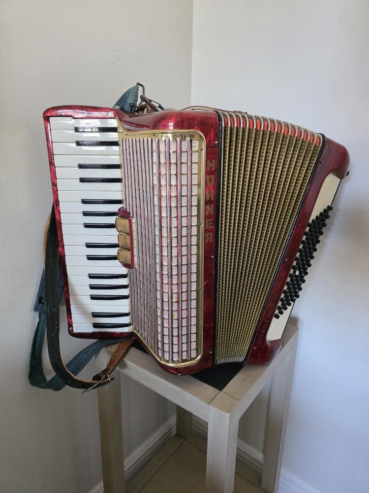 Vintage Red Hohner Piano Accordion.