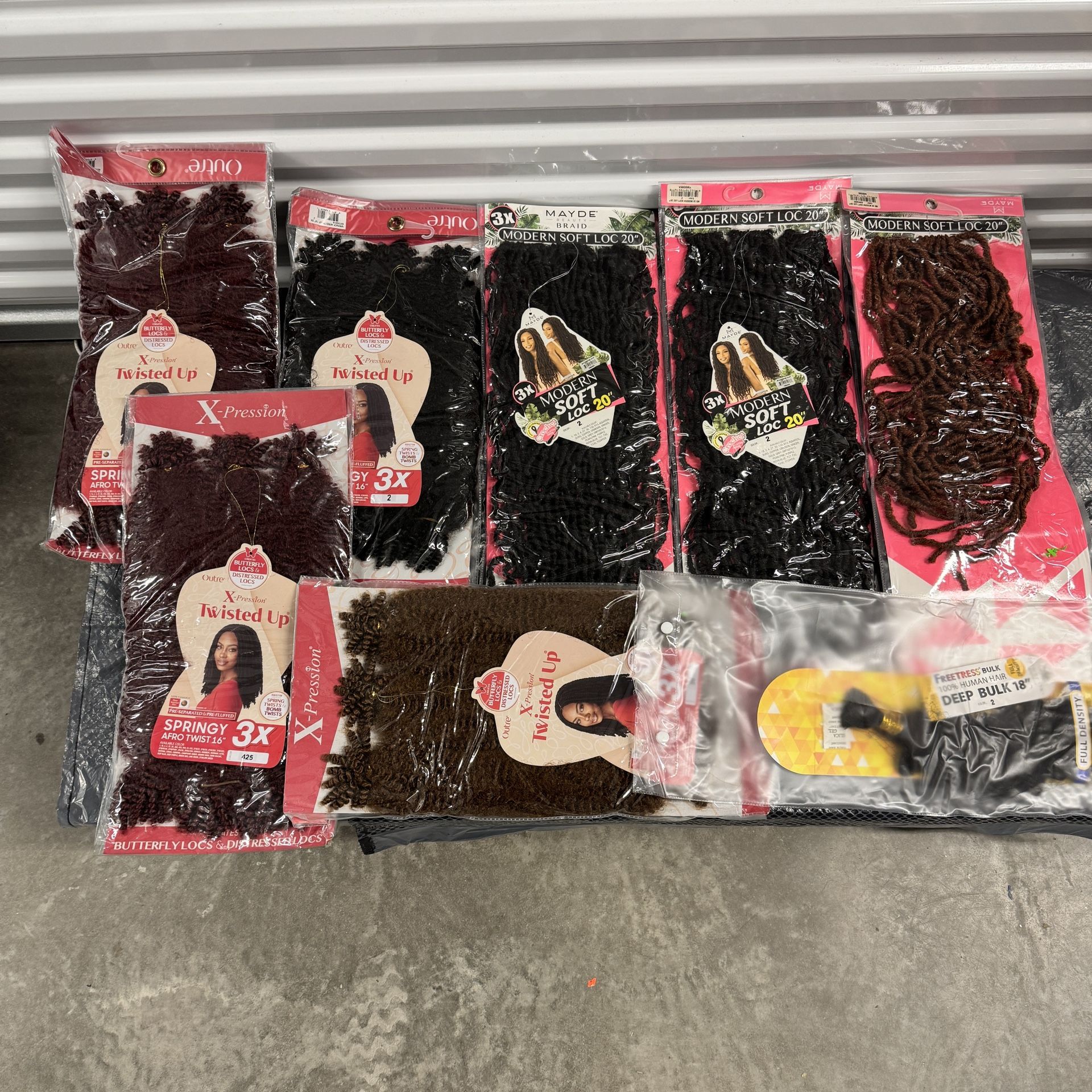 Various packages of synthetic braiding hair