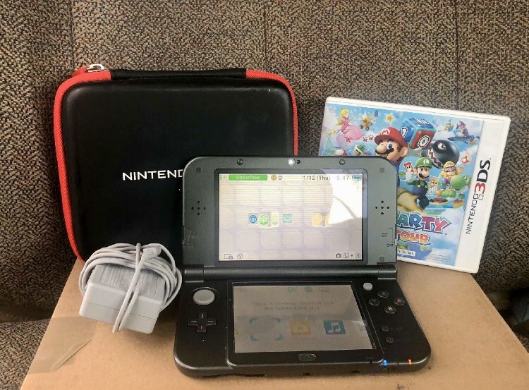 New Nintendo 3DS XL w/ Charger, Case, & One Mario Game