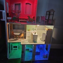 rainbow high doll house with accessories and color changing push lights in each room