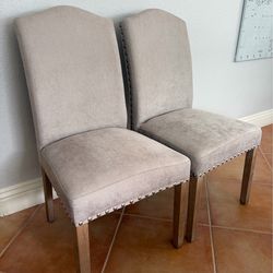2 Nailhead dining chairs