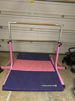 Adjustable gymnastics bar