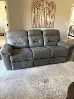 Power reclining sofa