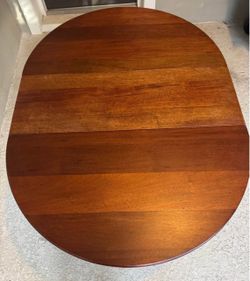 Gate leg drop off leaf wood table